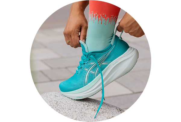 runner putting on shoe