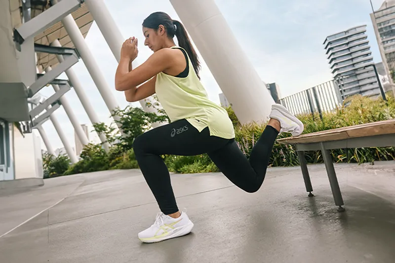 ASICS Athlete stretching.