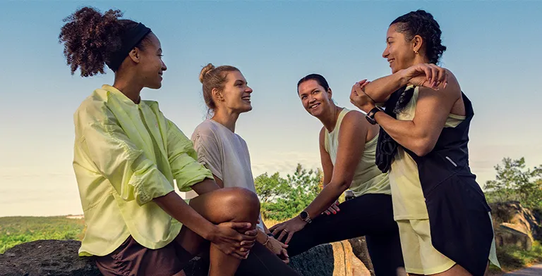 ASICS Athletes stretching after a workout.
